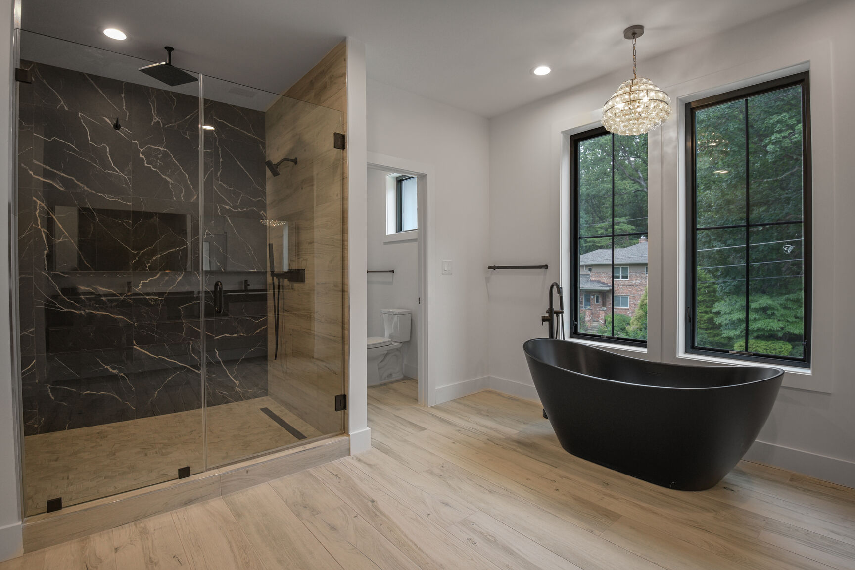 Master bath with marble glass shower